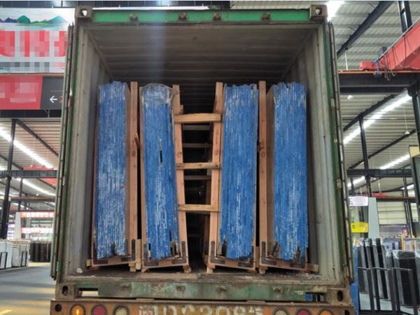 red travertine slabs loading