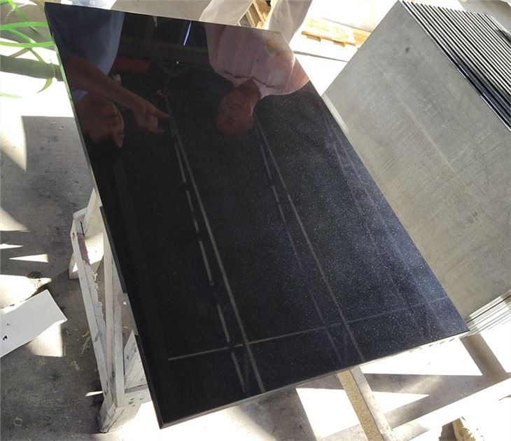 Black granite flooring tiles polished